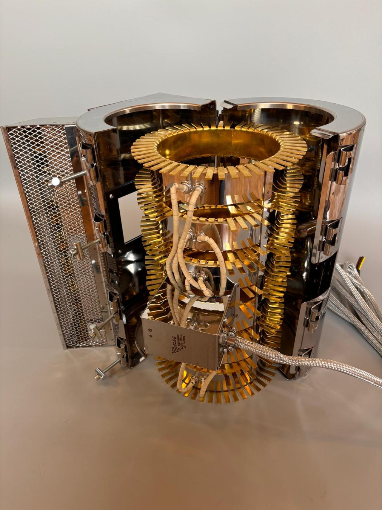 Heating and cooling unit with brass radiator.JPEG